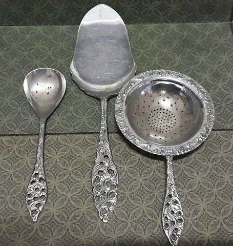 Chrome plated tea strainer/cake lifter/sugar spoon