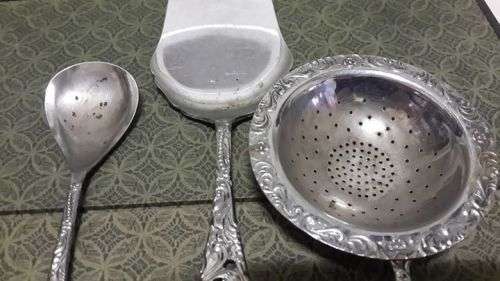 Chrome plated tea strainer/cake lifter/sugar spoon