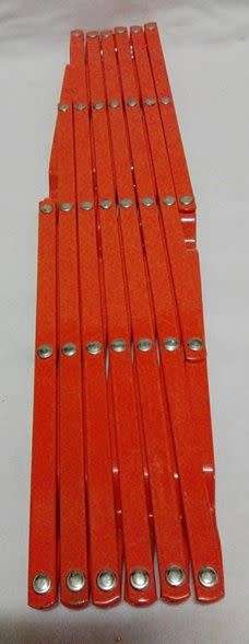 Vintage expandable trivet - orange!