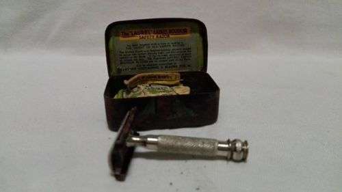 Small lady razor in tin - Look!