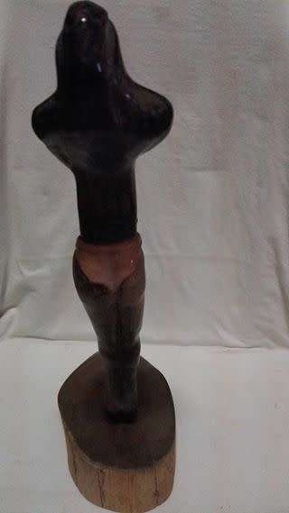 Tall ceramic sculpted  figurine on wooden stand LOOK!!