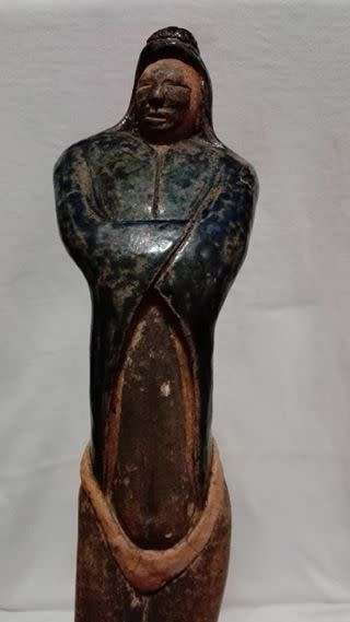 Tall ceramic sculpted  figurine on wooden stand LOOK!!