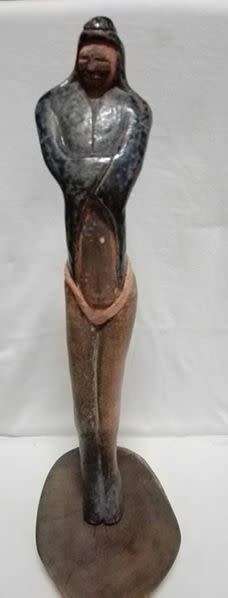 Tall ceramic sculpted  figurine on wooden stand LOOK!!