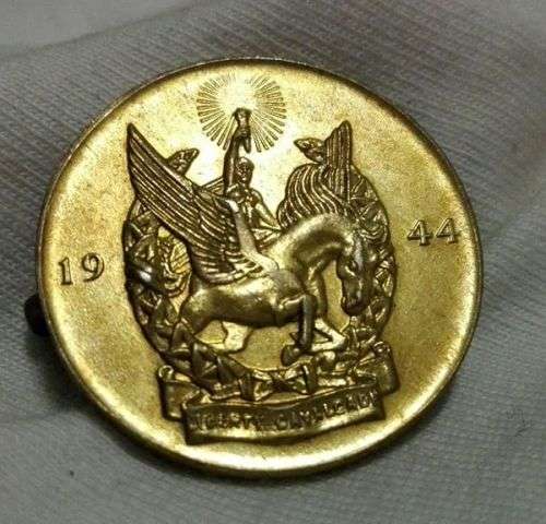 Lovely coin like badge 1944