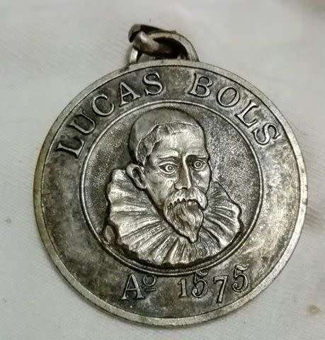 Lucas Bols pendant? - white metal, no markings