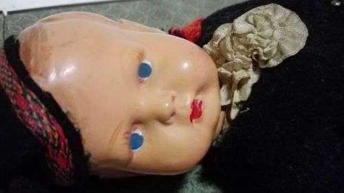 Vintage Doll - hard plastic? Limbs held together with wire. Bum needs attention. -Look!