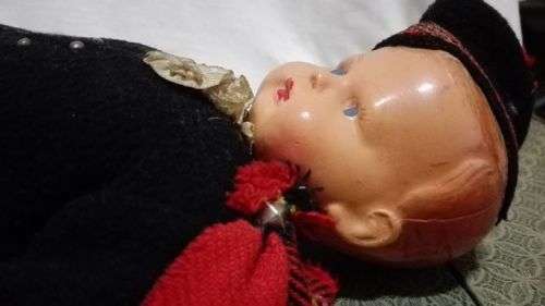 Vintage Doll - hard plastic? Limbs held together with wire. Bum needs attention. -Look!