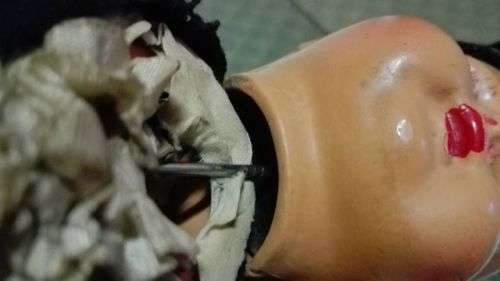Vintage Doll - hard plastic? Limbs held together with wire. Bum needs attention. -Look!