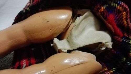 Vintage Doll - hard plastic? Limbs held together with wire. Bum needs attention. -Look!