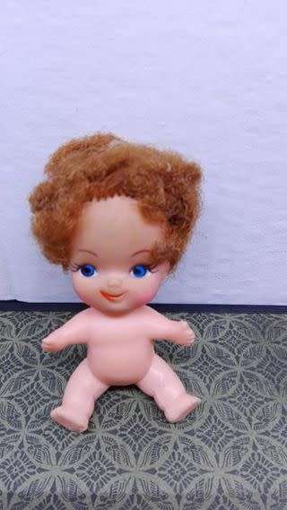 Pretty small doll made in Hong Kong!