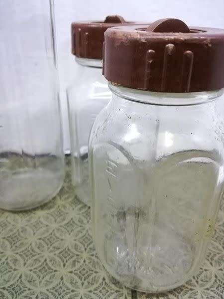 Vintage Glass Baby Bottles Everflow  With Lids!