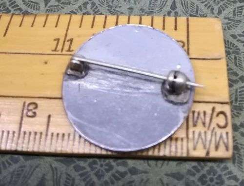 Dartboard brooch