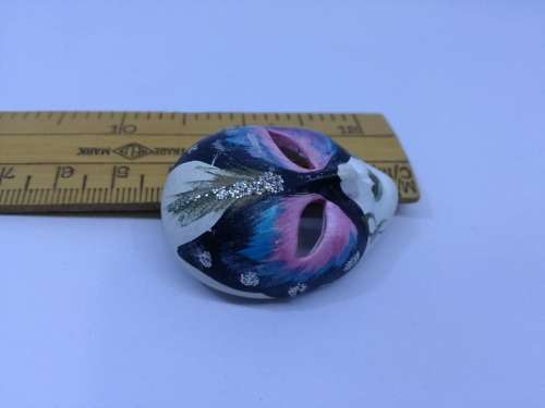 Mask brooch