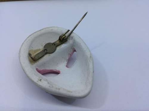 Mask brooch
