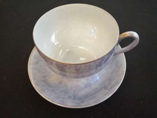 Over-sized Lustreware teacup and saucer