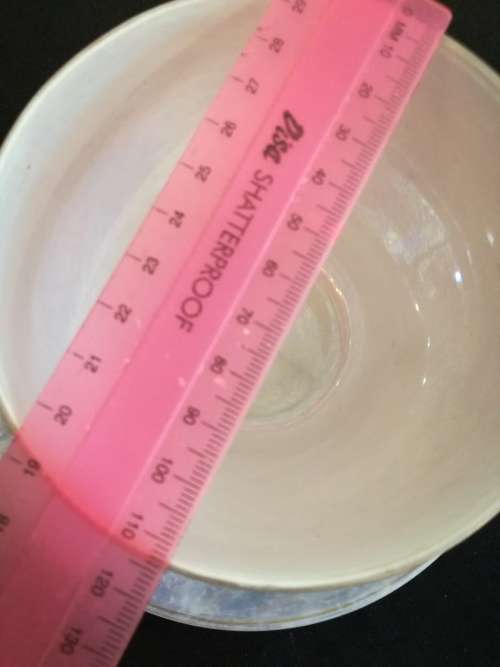Over-sized Lustreware teacup and saucer