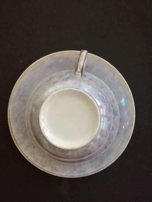Over-sized Lustreware teacup and saucer