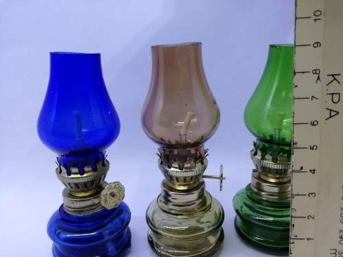 Set of three small glass oil lamps