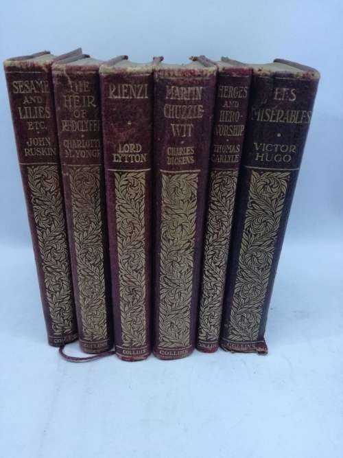 Leather bound books Author names written in gilt on front cover x 6