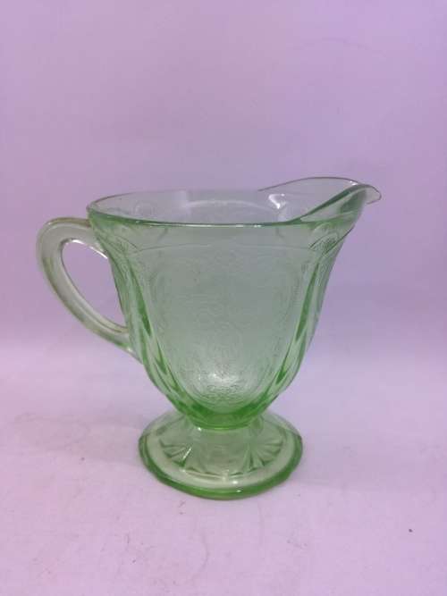 Vintage green pressed glass milk jug