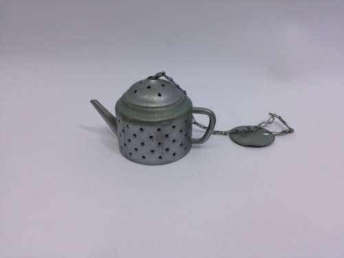 Vintage teapot tea infuser