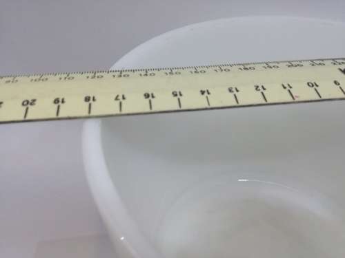 Milk glass mixing bowl