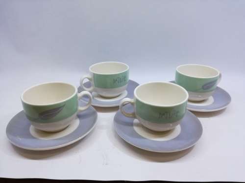 Small cup and saucers in milk glass