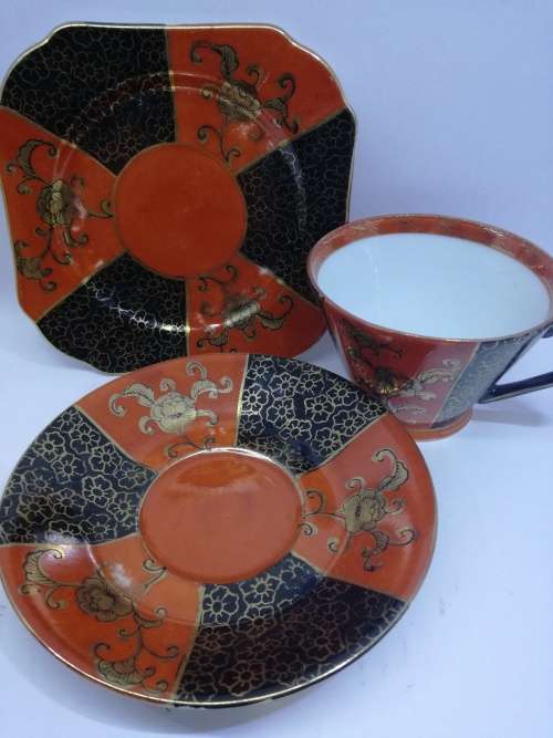 Unmarked orange and black trio