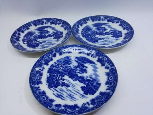 Three blue saucers