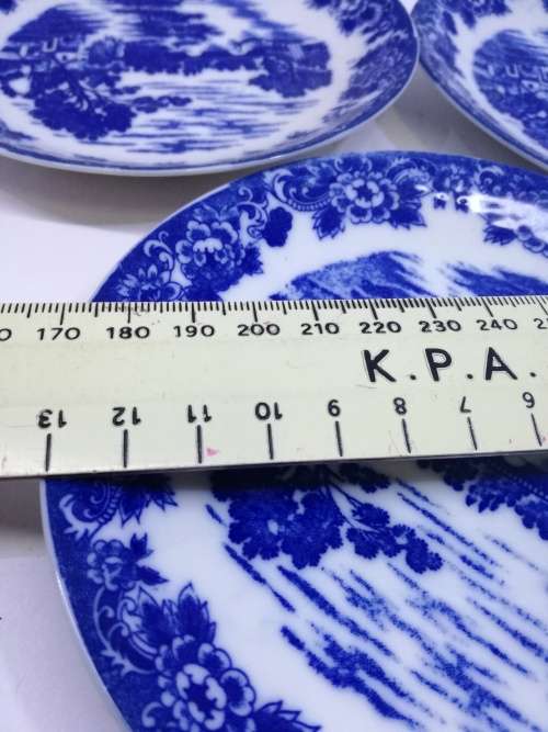 Three blue saucers
