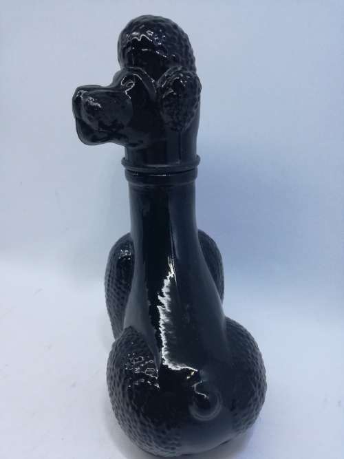 Vintage black milk glass Avon Poodle bottle - still full perfume!