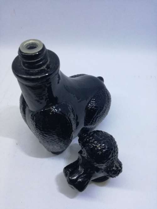 Vintage black milk glass Avon Poodle bottle - still full perfume!
