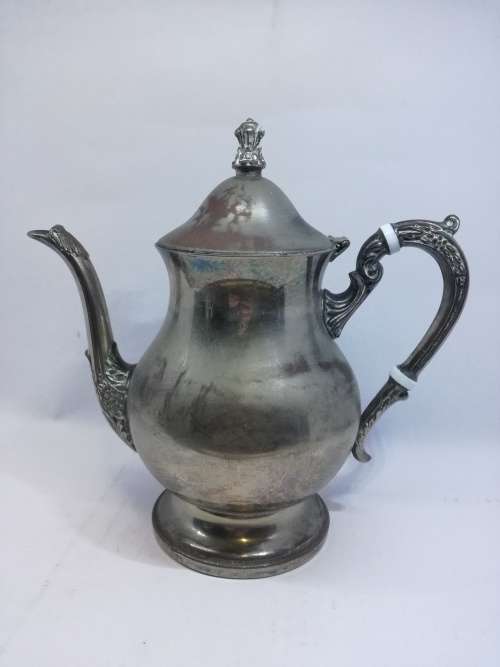 Lovely worn silver on copper coffee pot