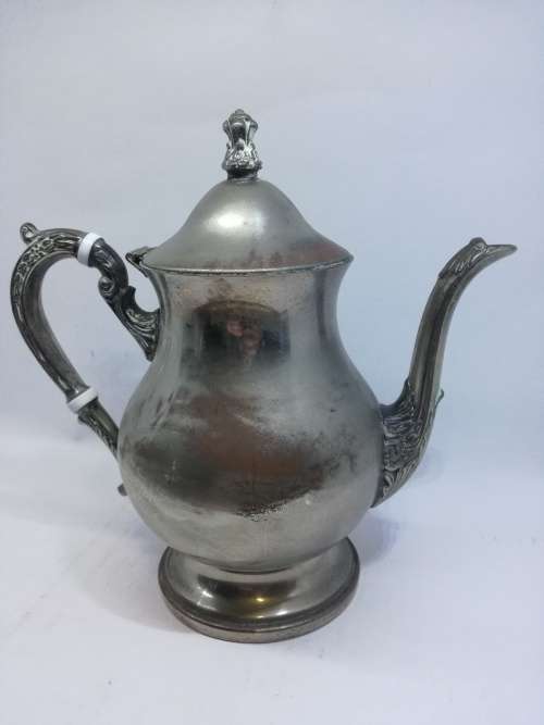 Lovely worn silver on copper coffee pot