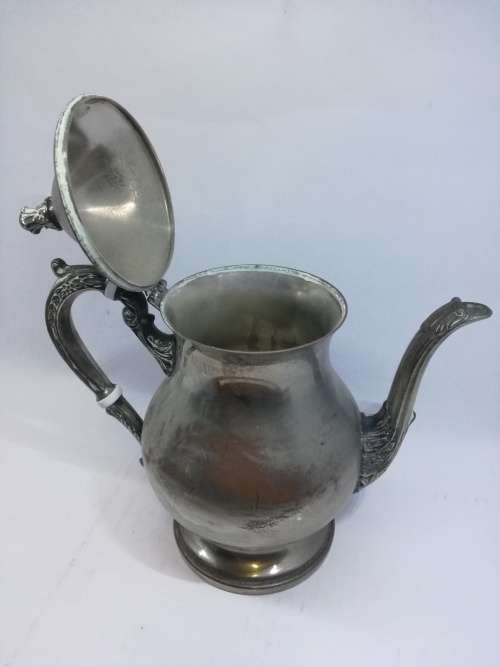 Lovely worn silver on copper coffee pot