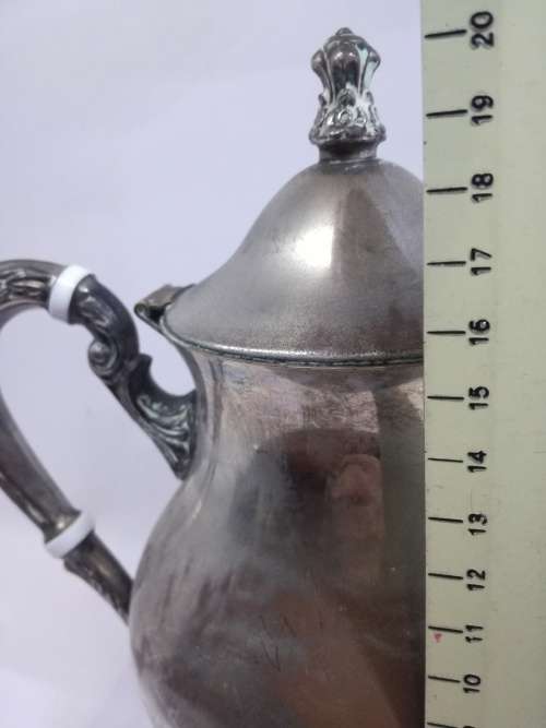 Lovely worn silver on copper coffee pot