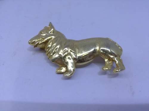 A doggie  brooch