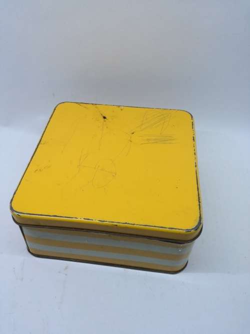 Yellow striped tin
