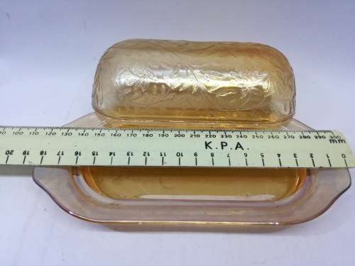 Vintage orange depression glass butter dish