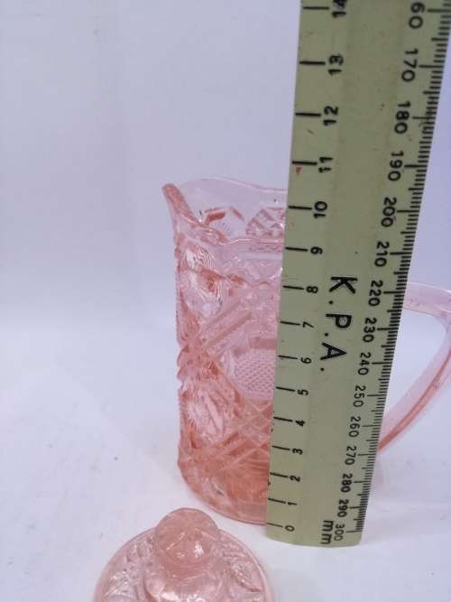 Vintage pink glass milk jug with lid
