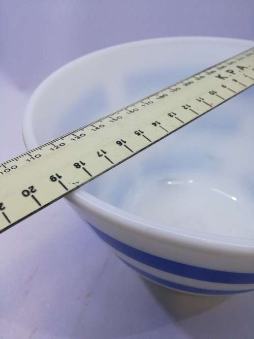 Blue striped milk glass mixing bowl