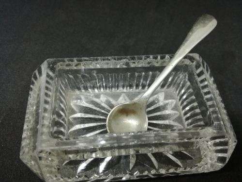 Small cut glass salt pot and spoon - the glass has a few small chips but still useable