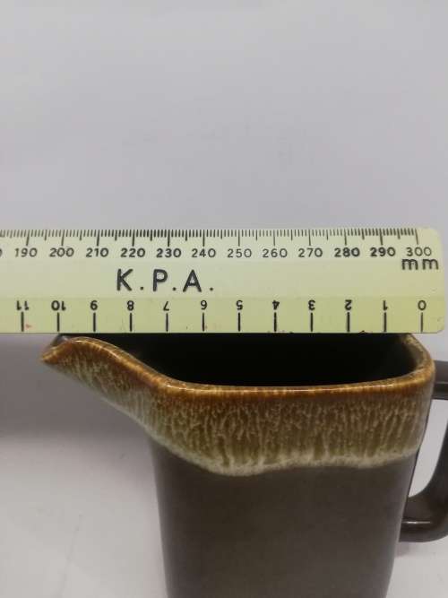 Vintage brown milk jug