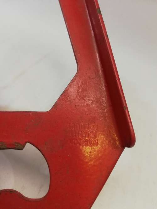 Red metal kitchen tool - opener