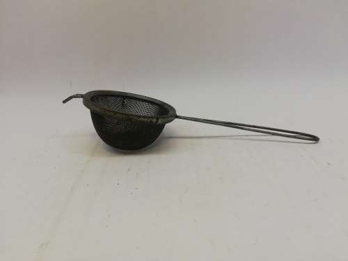 Vintage metal sieve