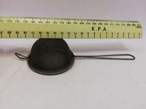 Vintage metal sieve