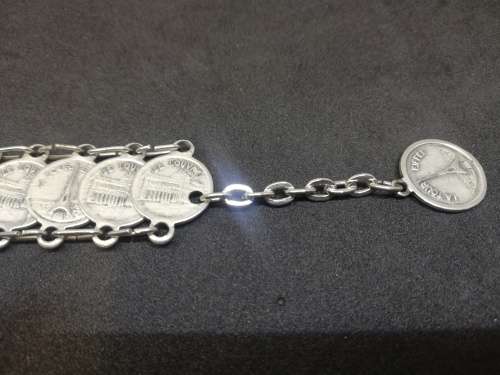 `Coin` bracelet