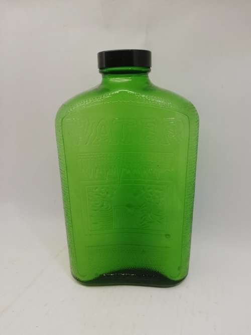 Green glass water bottle