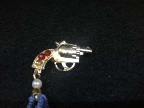 Cute revolver brooch