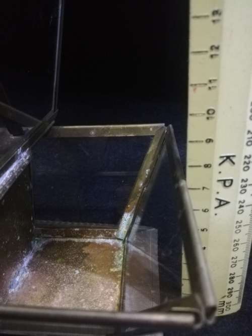 Delicate brass and glass basket